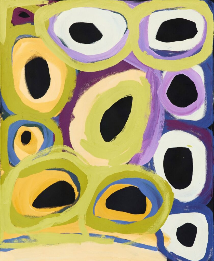 An abstract painting of black organically-shaped circles surrounded by larger, roughly painted circles in green, purple, blue and yellow