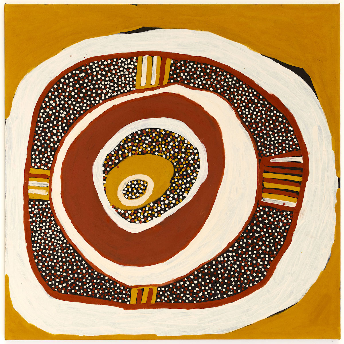 Abstract painting of organic circles, lines and dots in cream, red, yellow ochre and black.